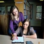 two girls tutoring describe the image
