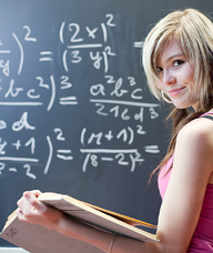 Girl working on GMAT Quant problems.